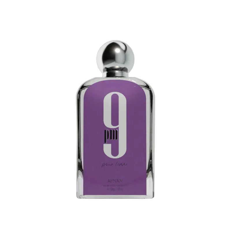 Perfume bottle with purple label and silver cap on a white background