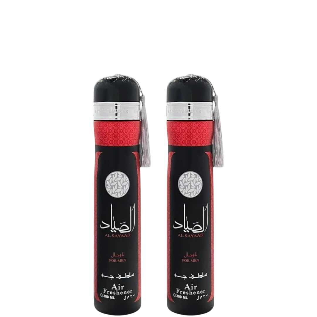 Two red and black Al Sayaad Air Freshener Spray bottles with silver caps on a white background with a silver top on a white background