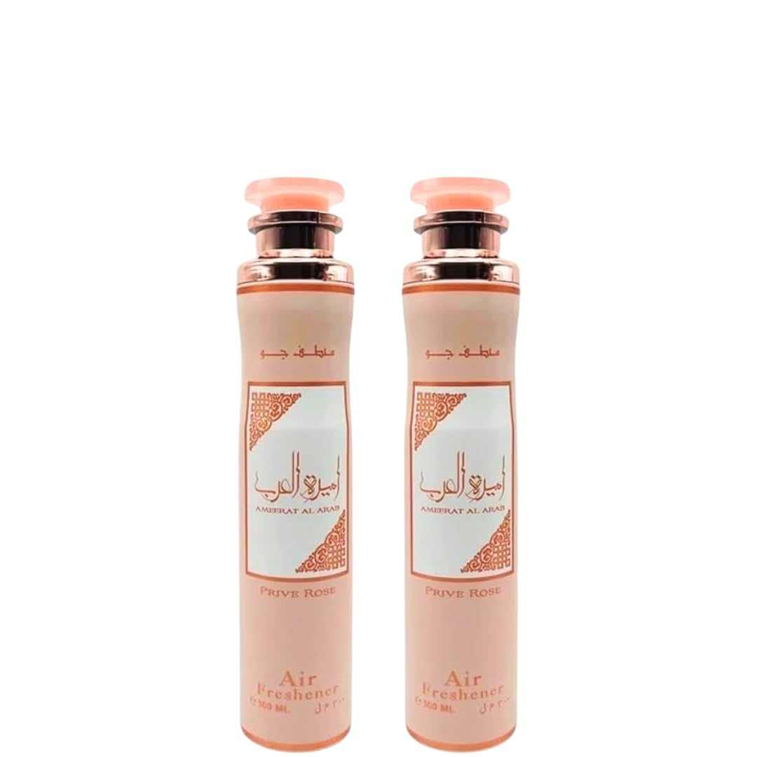 Two Ameenat Al Arab Prive Rose Air Freshener bottles with a white background
