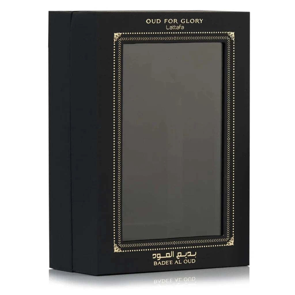 Black box with gold text Badee Al Oud Eau De Parfum branding on a white background