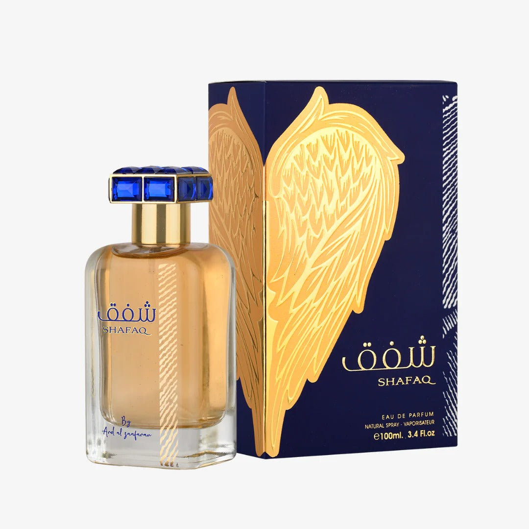 Shafaq perfume 100ml bottle and packaging with a gold wing design on a white background